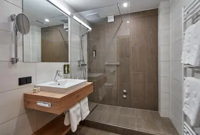 Ein Badezimmer in der Unterkunft Hotel Alpenhof