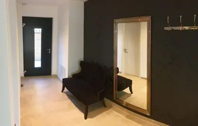 Ein Sitzbereich in der Unterkunft Ferienhaus Achmühle