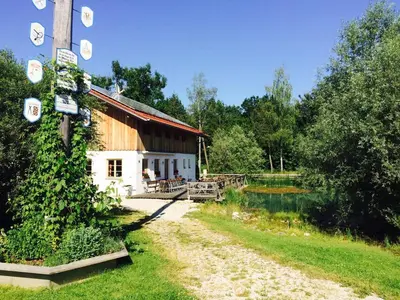 Ein Garten an der Unterkunft Ferienhaus Achmühle