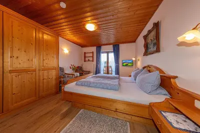 Ein Bett oder Betten in einem Zimmer der Unterkunft Gästehaus Simon