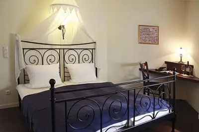 Ein Bett oder Betten in einem Zimmer der Unterkunft Schlosshof anno 1743