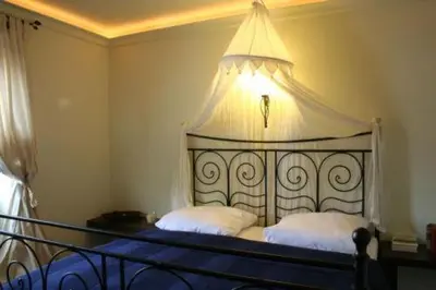 Ein Bett oder Betten in einem Zimmer der Unterkunft Schlosshof anno 1743