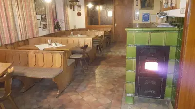 Ein Sitzbereich in der Unterkunft Pension Elsendorf