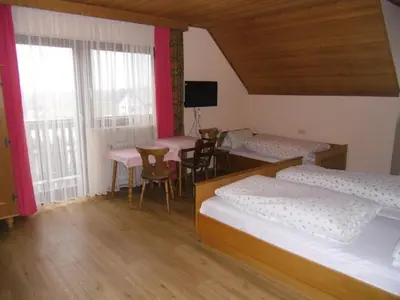 Ein Bett oder Betten in einem Zimmer der Unterkunft Pension Elsendorf