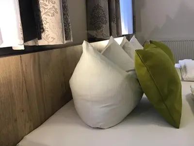 Ein Bett oder Betten in einem Zimmer der Unterkunft Gasthof Hotel Esterer