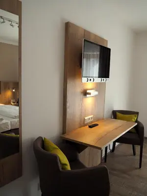Ein Bett oder Betten in einem Zimmer der Unterkunft Gasthof Hotel Esterer