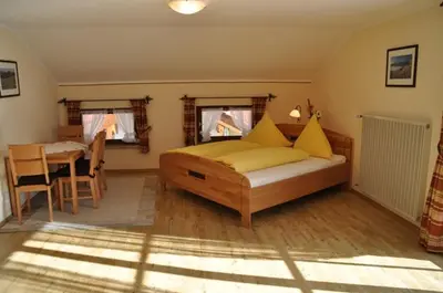 Ein Bett oder Betten in einem Zimmer der Unterkunft Cafe Wastelbauerhof - Urlaub auf dem Bauernhof