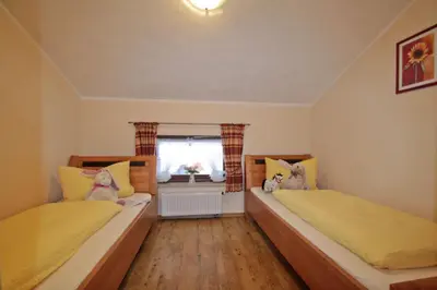 Ein Bett oder Betten in einem Zimmer der Unterkunft Cafe Wastelbauerhof - Urlaub auf dem Bauernhof