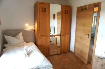 Ein Bett oder Betten in einem Zimmer der Unterkunft Ferienwohnung Lorenz