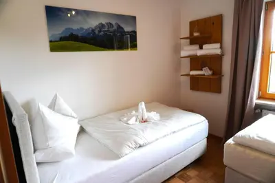 Ein Bett oder Betten in einem Zimmer der Unterkunft Ferienwohnung Lorenz