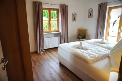 Ein Bett oder Betten in einem Zimmer der Unterkunft Ferienwohnung Lorenz