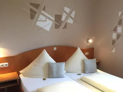 Ein Bett oder Betten in einem Zimmer der Unterkunft Pension Wagner