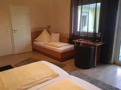 Ein Bett oder Betten in einem Zimmer der Unterkunft Pension Wagner