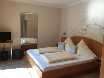 Ein Bett oder Betten in einem Zimmer der Unterkunft Pension Wagner