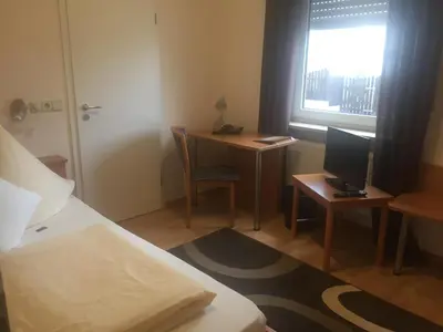 Ein Bett oder Betten in einem Zimmer der Unterkunft Pension Wagner