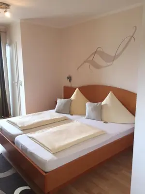 Ein Bett oder Betten in einem Zimmer der Unterkunft Pension Wagner