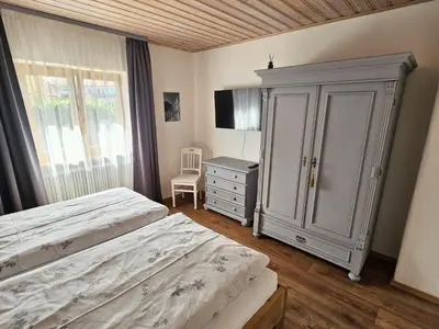 Ein Bett oder Betten in einem Zimmer der Unterkunft Ferienwohnung Schnappenblick