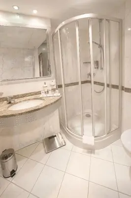 Ein Badezimmer in der Unterkunft City Hotel Isar-Residenz