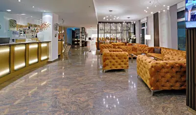 Ein Sitzbereich in der Unterkunft City Hotel Isar-Residenz