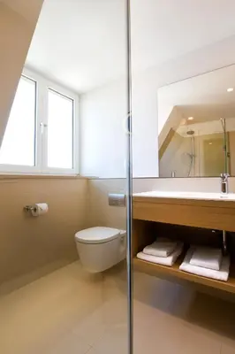 Ein Badezimmer in der Unterkunft Hotel Thalmair
