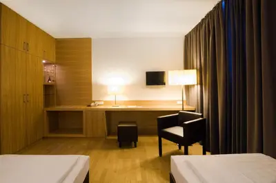 Ein Bett oder Betten in einem Zimmer der Unterkunft Hotel Thalmair