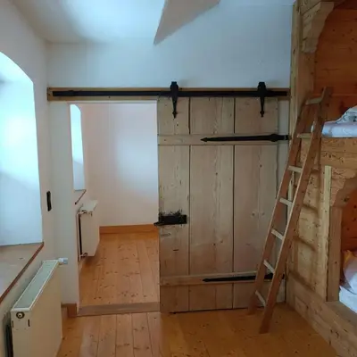 Ein Etagenbett oder Etagenbetten in einem Zimmer der Unterkunft Historisches Pfarrhaus Nähe Schloss Neuschwanstein