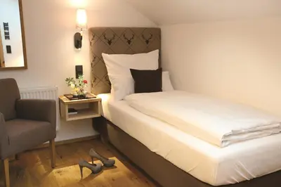 Ein Bett oder Betten in einem Zimmer der Unterkunft Sepperlwirt