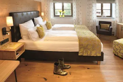 Ein Bett oder Betten in einem Zimmer der Unterkunft Sepperlwirt