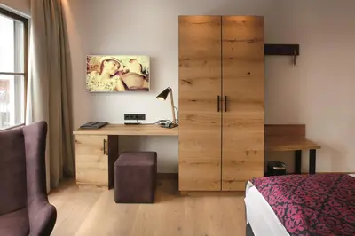Ein Bett oder Betten in einem Zimmer der Unterkunft Sepperlwirt