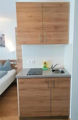 Küche/Küchenzeile in der Unterkunft easy sleep Apartmenthotel