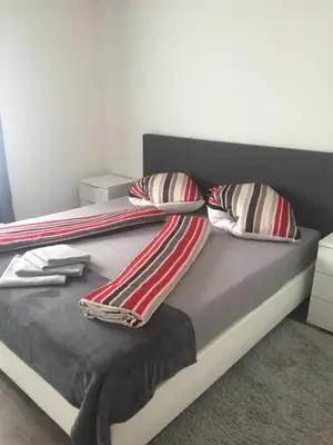 Ein Bett oder Betten in einem Zimmer der Unterkunft Augsburger Apartment