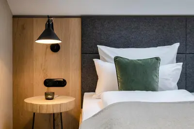 Ein Bett oder Betten in einem Zimmer der Unterkunft Hussnhof Farm Lodge