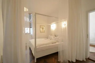 Ein Bett oder Betten in einem Zimmer der Unterkunft Asante-Design-Apartment Deluxe - very central