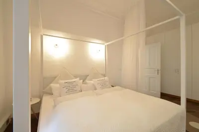 Ein Bett oder Betten in einem Zimmer der Unterkunft Asante-Design-Apartment Deluxe - very central