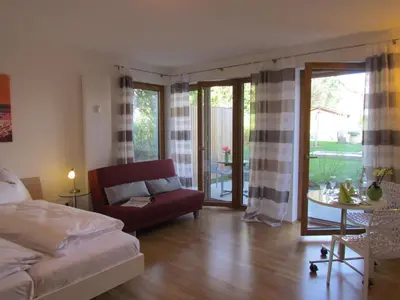 Ein Sitzbereich in der Unterkunft AMENITY-Garden-Apartments