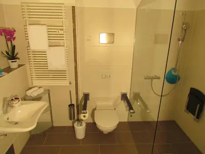 Ein Badezimmer in der Unterkunft AMENITY-Garden-Apartments