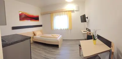 Ein Bett oder Betten in einem Zimmer der Unterkunft Pension RoBi