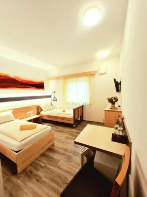 Ein Bett oder Betten in einem Zimmer der Unterkunft Pension RoBi