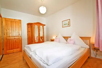 Ein Bett oder Betten in einem Zimmer der Unterkunft Ferienwohnungen Wanderparadies