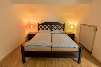 Ein Bett oder Betten in einem Zimmer der Unterkunft Alpen Deluxe Oberammergau
