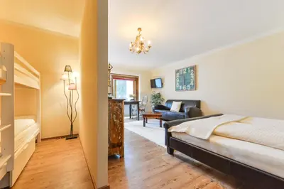 Ein Bett oder Betten in einem Zimmer der Unterkunft Alpen Deluxe Oberammergau