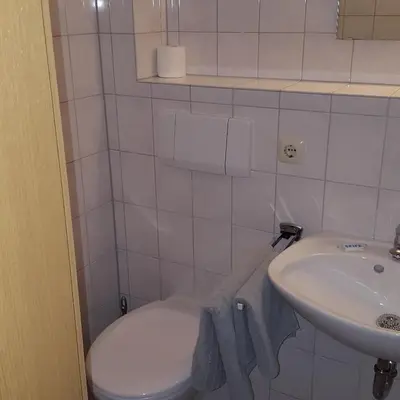 Ein Badezimmer in der Unterkunft Lenggrieser Hof
