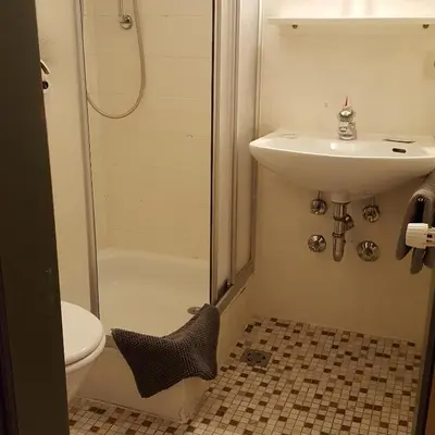 Ein Badezimmer in der Unterkunft Lenggrieser Hof