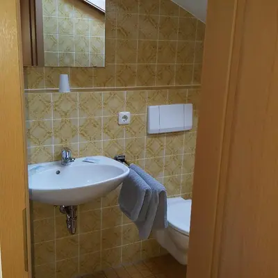 Ein Badezimmer in der Unterkunft Lenggrieser Hof