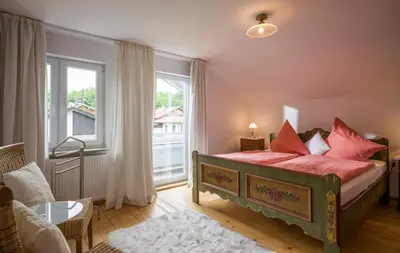 Ein Bett oder Betten in einem Zimmer der Unterkunft Landhaus Kaiserblick