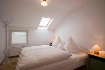 Ein Bett oder Betten in einem Zimmer der Unterkunft Landhaus Kaiserblick