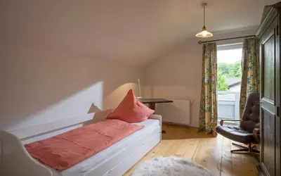 Ein Bett oder Betten in einem Zimmer der Unterkunft Landhaus Kaiserblick