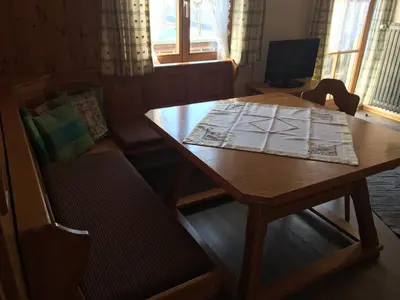 Ein Sitzbereich in der Unterkunft Zum Bergbauer