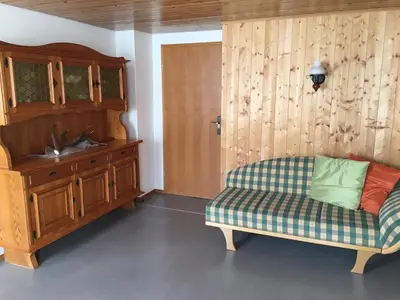 Ein Sitzbereich in der Unterkunft Zum Bergbauer