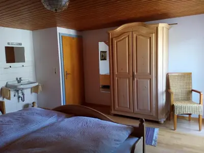 Ein Bett oder Betten in einem Zimmer der Unterkunft Haus Huber